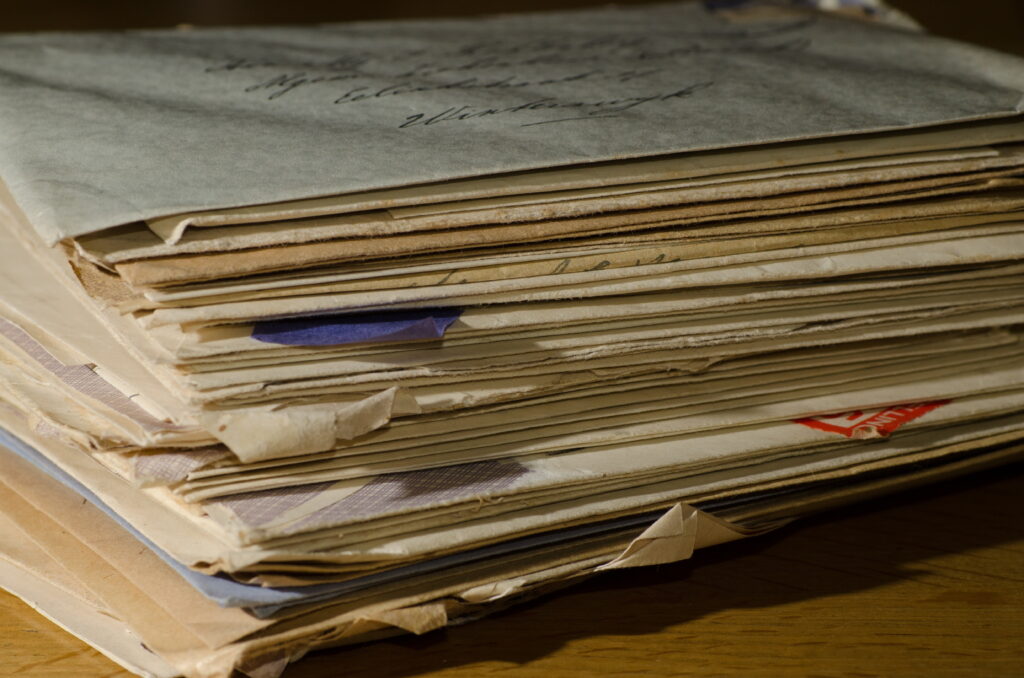 A stack of handwritten letters